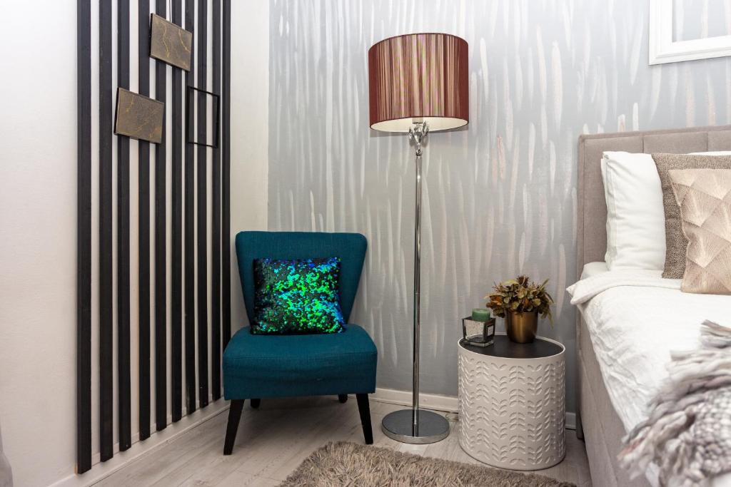 Posteľ alebo postele v izbe v ubytovaní Spacious Apartment Center