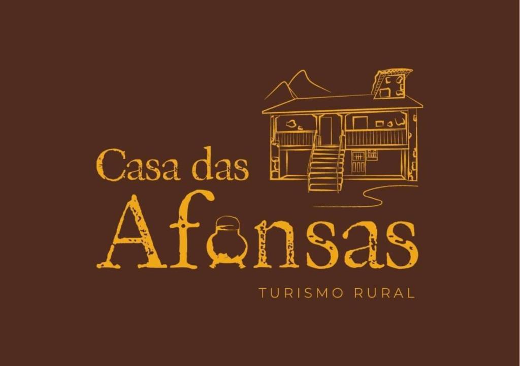 un logotipo para el restaurante aarmaarmaarma con un dibujo de una casa en Casa das Afonsas, en Barral