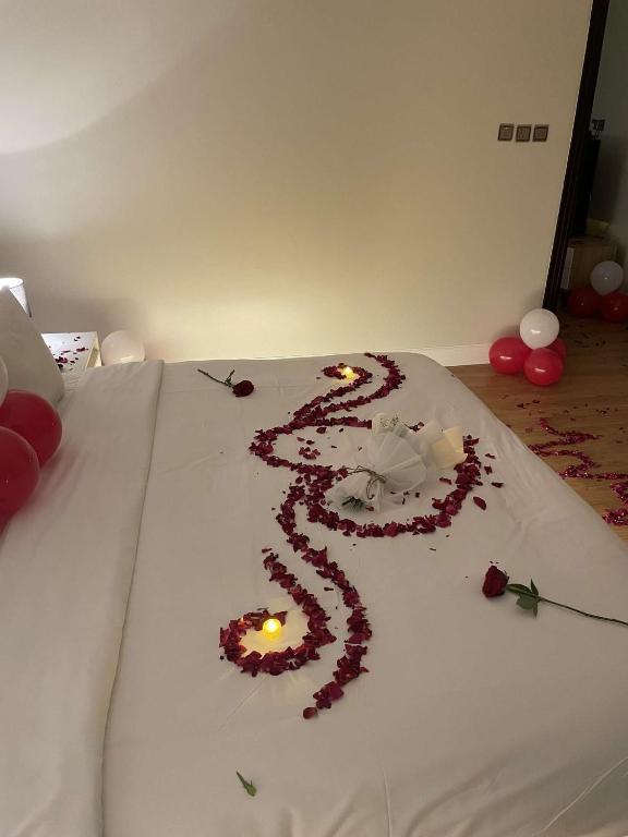 Postel nebo postele na pokoji v ubytování فندق السلطنة جازان -Alsltanah Jazan Hotel