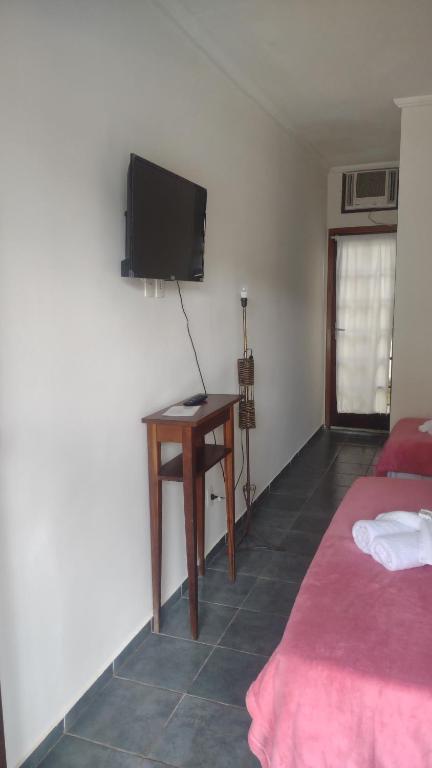 Televízia a/alebo spoločenská miestnosť v ubytovaní solar das margaridas
