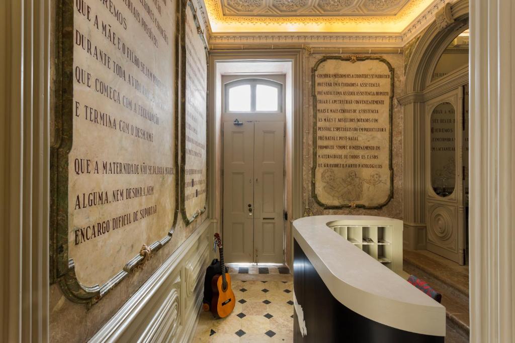Um banheiro em Serenata Hotel & Hostel Coimbra