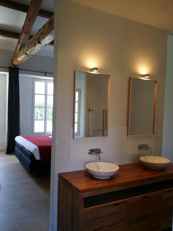 Voodi või voodid majutusasutuse L'Observance Bed & Breakfast toas