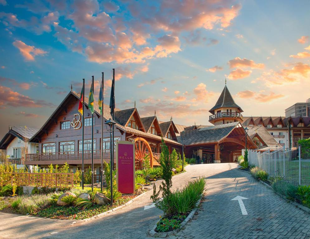 a lodge with a building with a sign in front of it at Bella Gramado Resort & Spa by Gramado Parks in Gramado