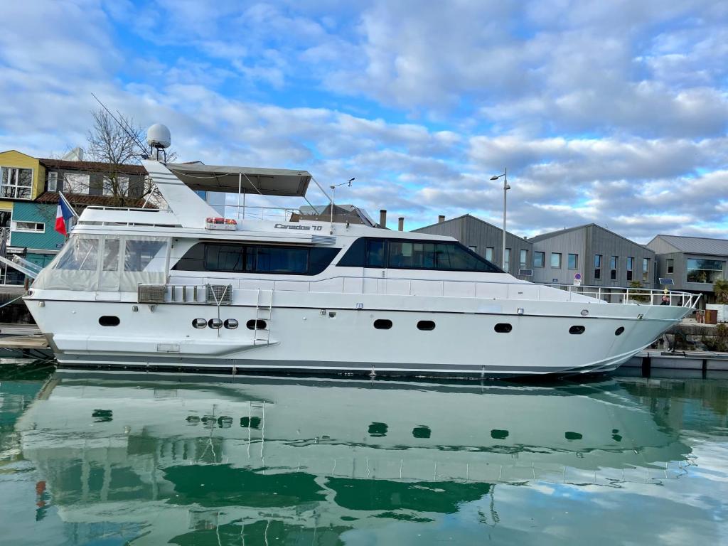 a white yacht is docked in the water at Yacht Aquamarina vieux port La Rochelle in La Rochelle