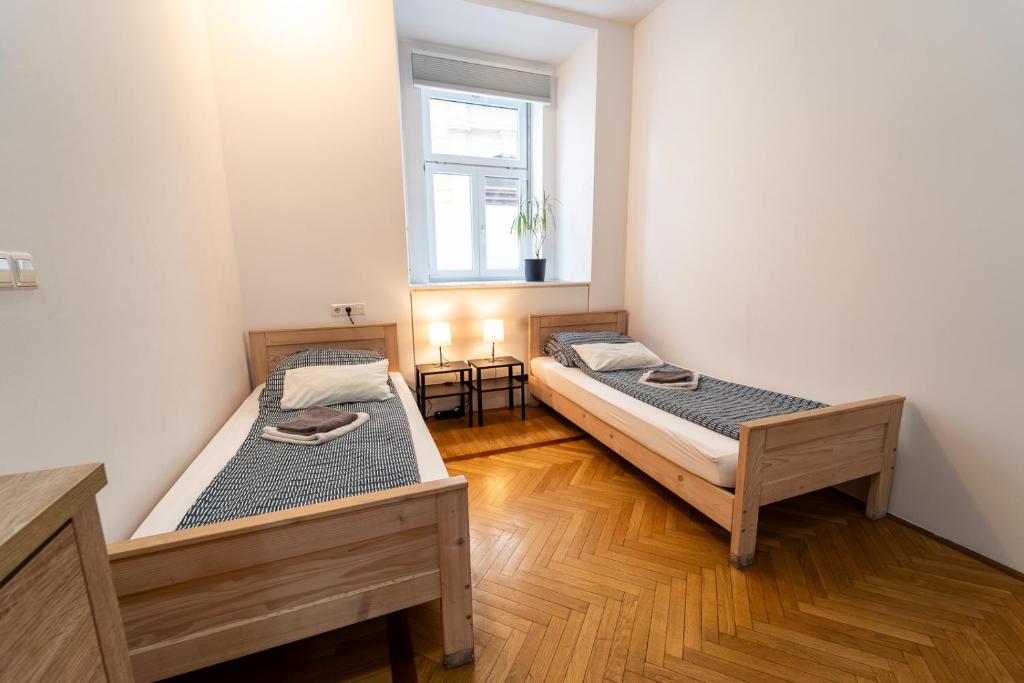 Postel nebo postele na pokoji v ubytování Anna House