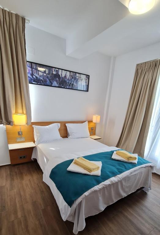 Postel nebo postele na pokoji v ubytování Jafar Resort 6