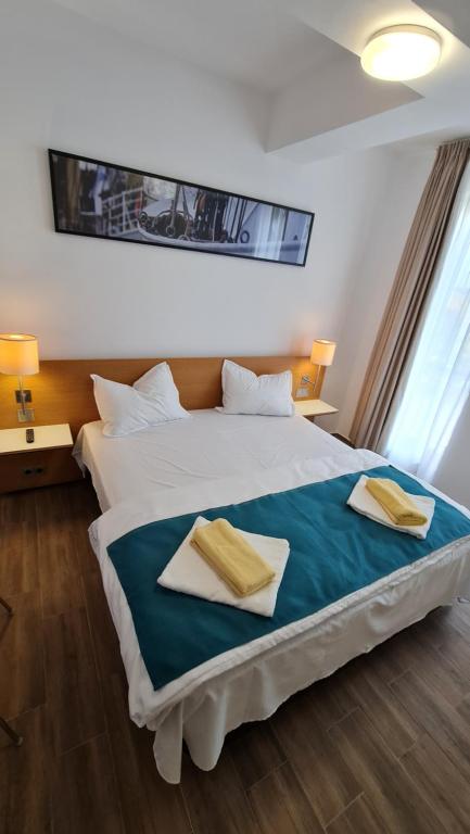 Postel nebo postele na pokoji v ubytování Jafar Resort 6