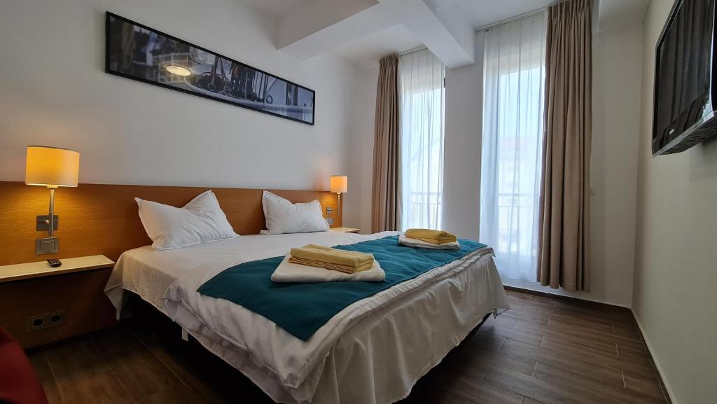 Postel nebo postele na pokoji v ubytování Jafar Resort 6