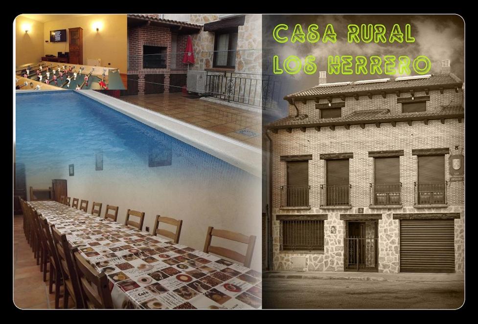 un edificio y una piscina al lado de un edificio en Los Herrero, en Zarzuela del Monte