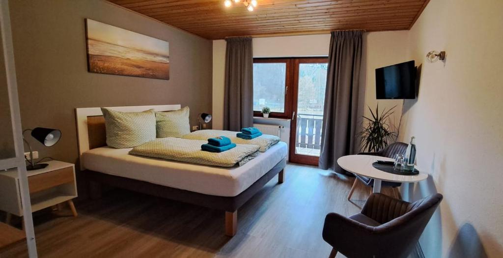 TV a/nebo společenská místnost v ubytování Brauhaus am See