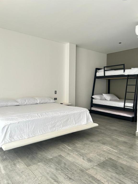 Postel nebo postele na pokoji v ubytování Finca La Casa de Pablo