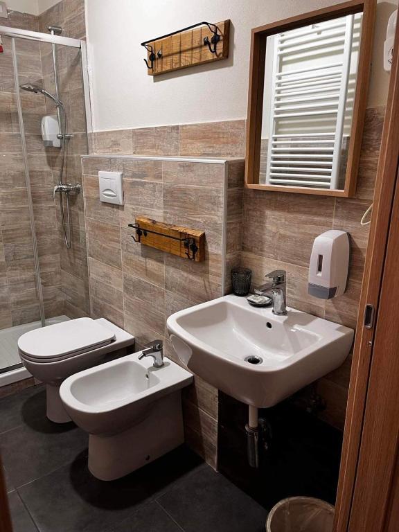 Koupelna v ubytování La Taverna del Metallo Rooms