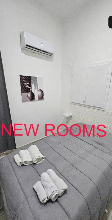 Postel nebo postele na pokoji v ubytování HOTEL CRISARI