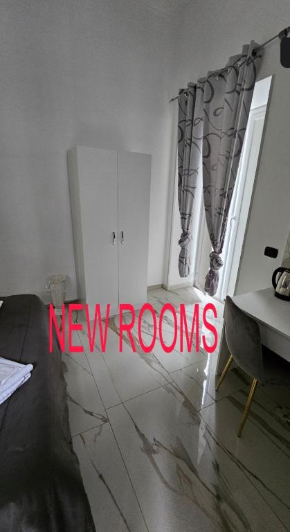 Postel nebo postele na pokoji v ubytování HOTEL CRISARI