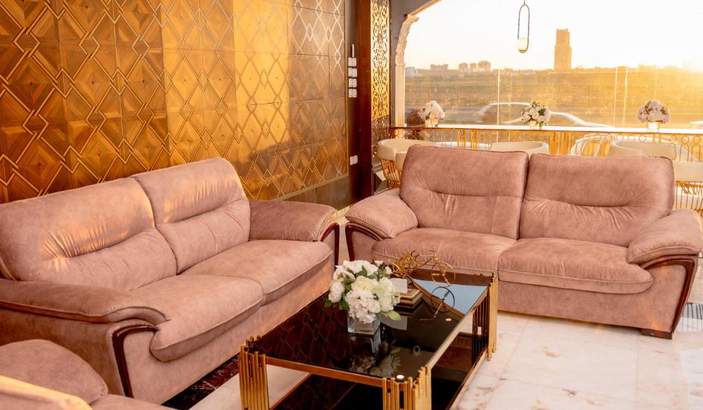 Posezení v ubytování Areen Hotel فندق ارين