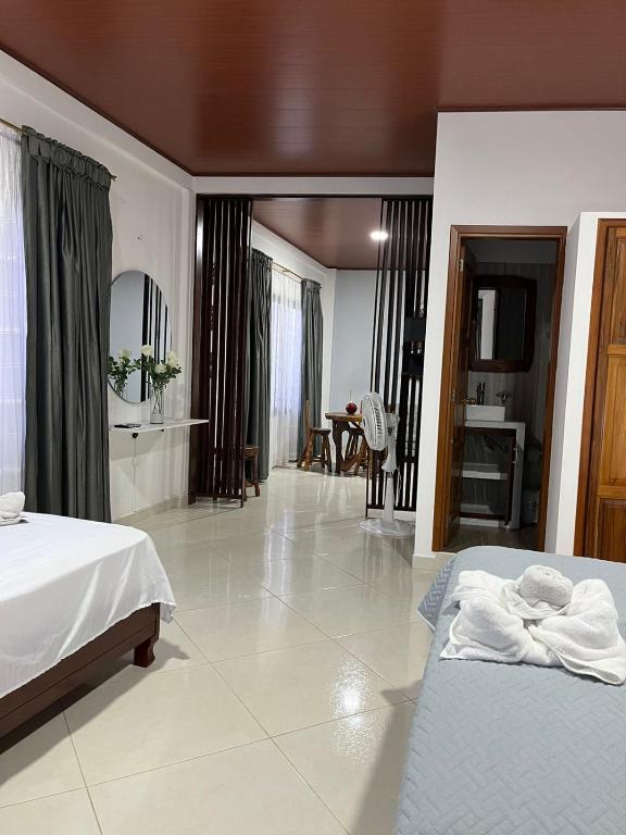 Postel nebo postele na pokoji v ubytování Hotel la casona de Wiky