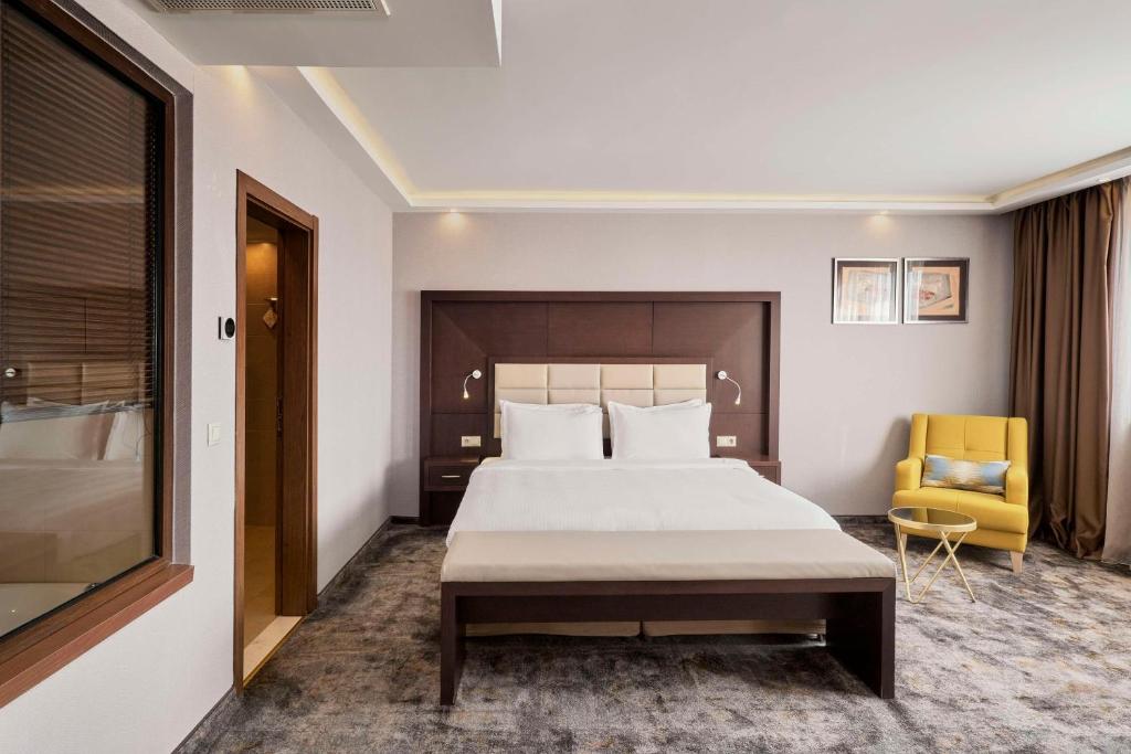 Säng eller sängar i ett rum på Radisson Hotel Plovdiv