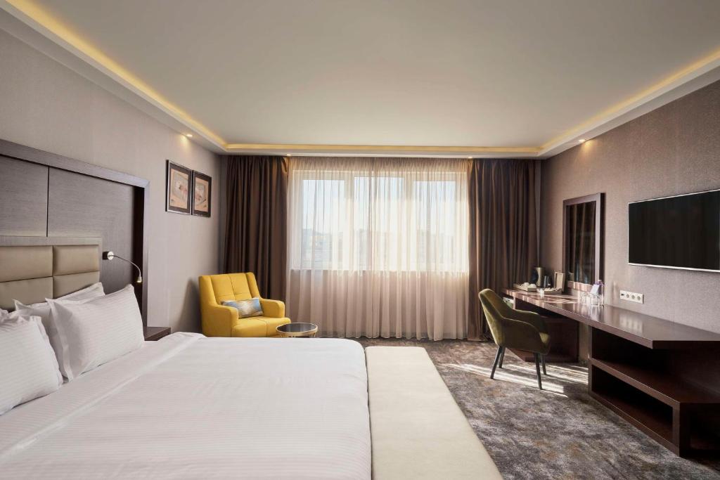 Säng eller sängar i ett rum på Radisson Hotel Plovdiv