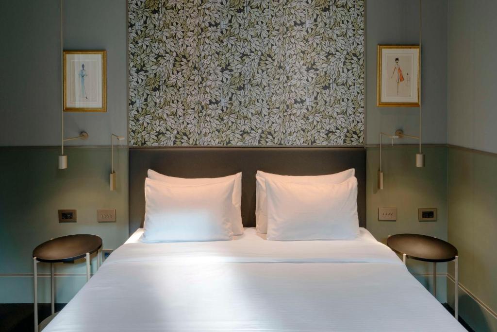 Postel nebo postele na pokoji v ubytování Radisson Collection Hotel, Roma Antica