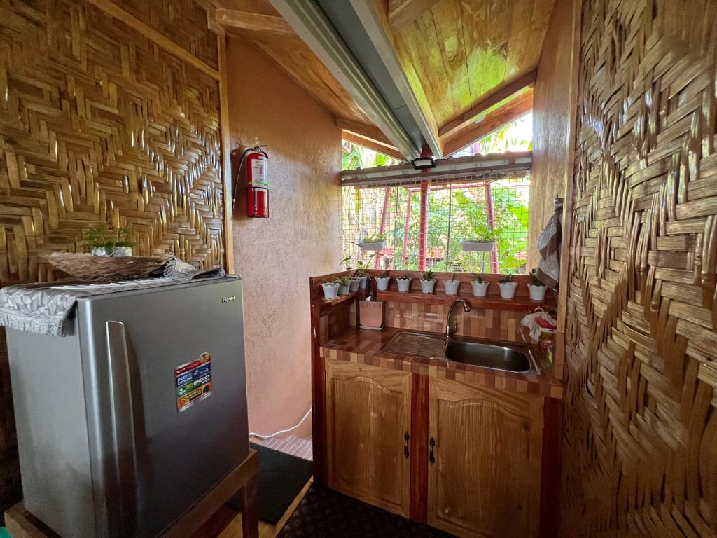 Kuchyň nebo kuchyňský kout v ubytování Ozar Homestay