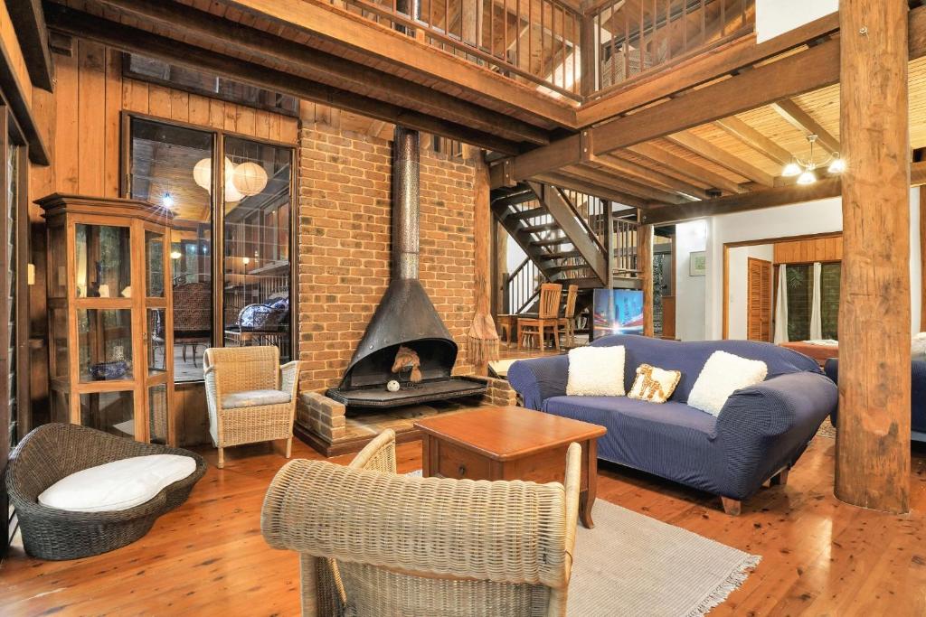 Posezení v ubytování Kuranda Rainforest Chalet