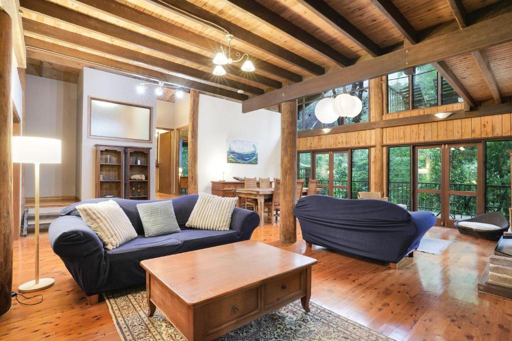 Posezení v ubytování Kuranda Rainforest Chalet
