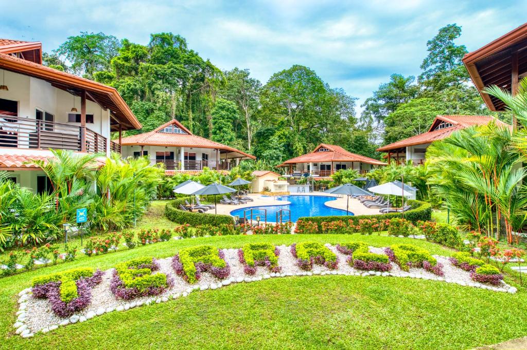 an image of a resort with a swimming pool at Terrazas del Caribe Aparthotel in Puerto Viejo