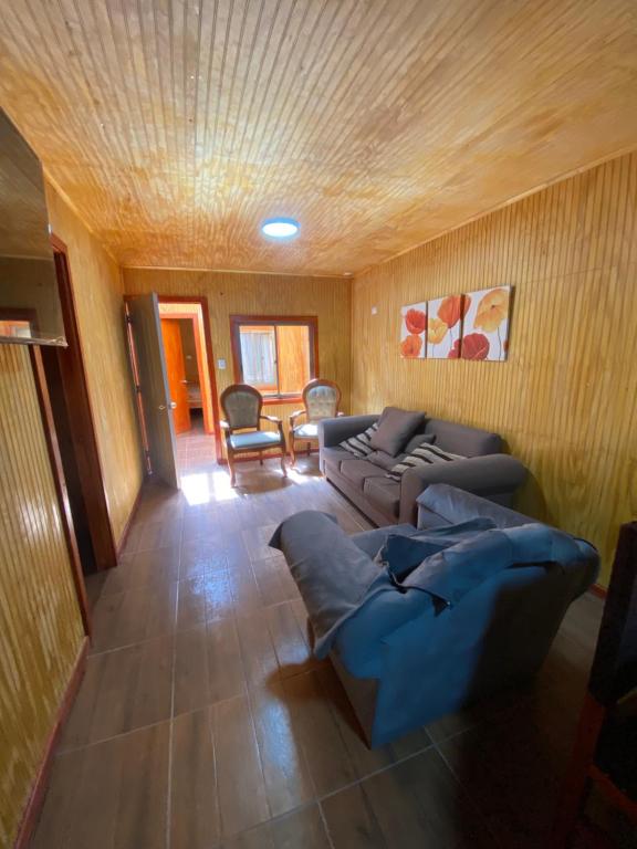 Posezení v ubytování Hostal Coronel Riffo