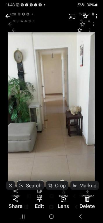 a view of a living room with a hallway at Apartment Near The Airport in Nairobi