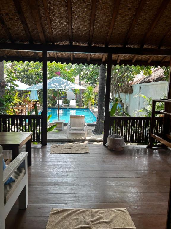 Bazén v ubytování Unzipp Bungalows Gili Air nebo v jeho okolí