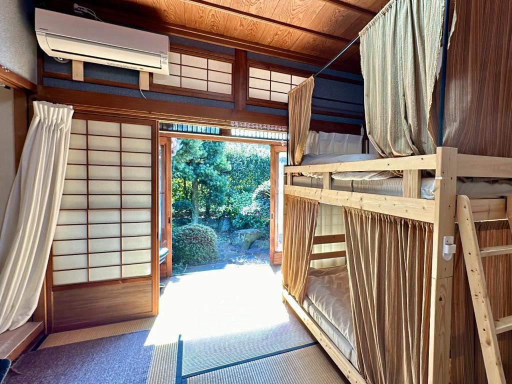 Fotografie z fotogalerie ubytování Guest House 古民家 NAGOMI v destinaci Izumi-Sano