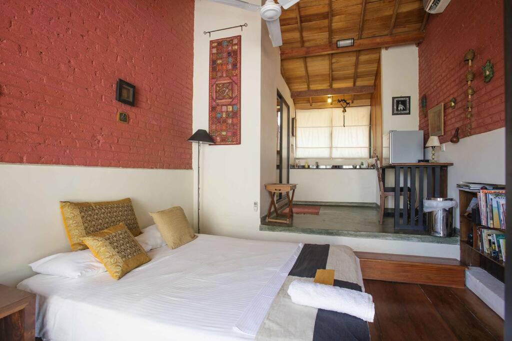 Postel nebo postele na pokoji v ubytování Highbury Colombo