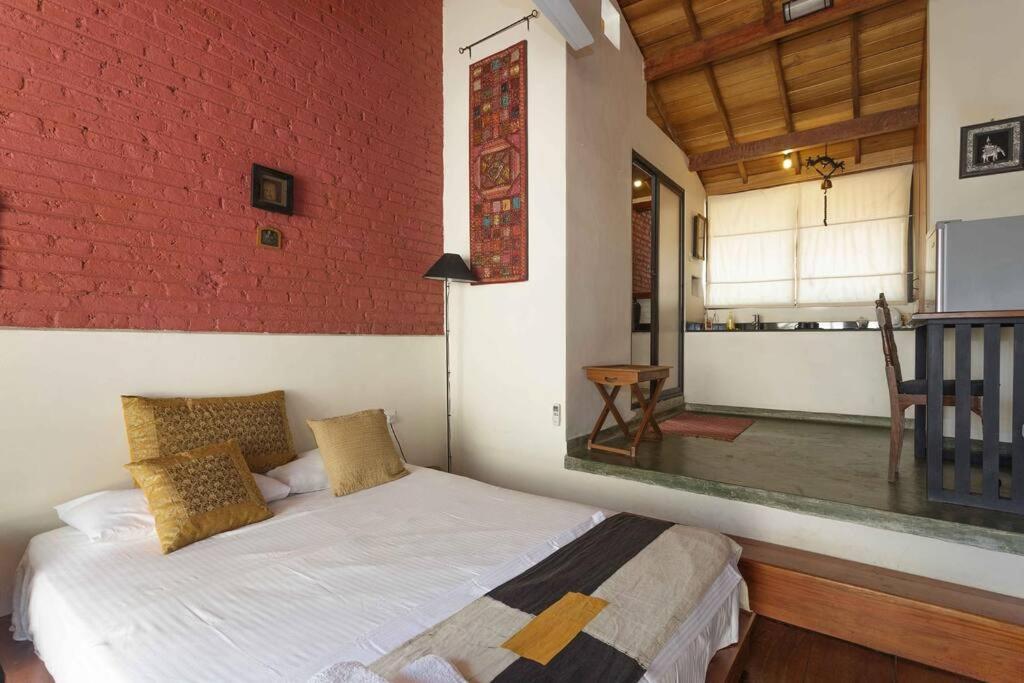 Postel nebo postele na pokoji v ubytování Highbury Colombo