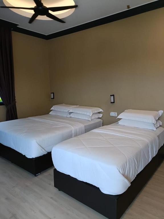 Postel nebo postele na pokoji v ubytování Perry Barr La Ganta Residence