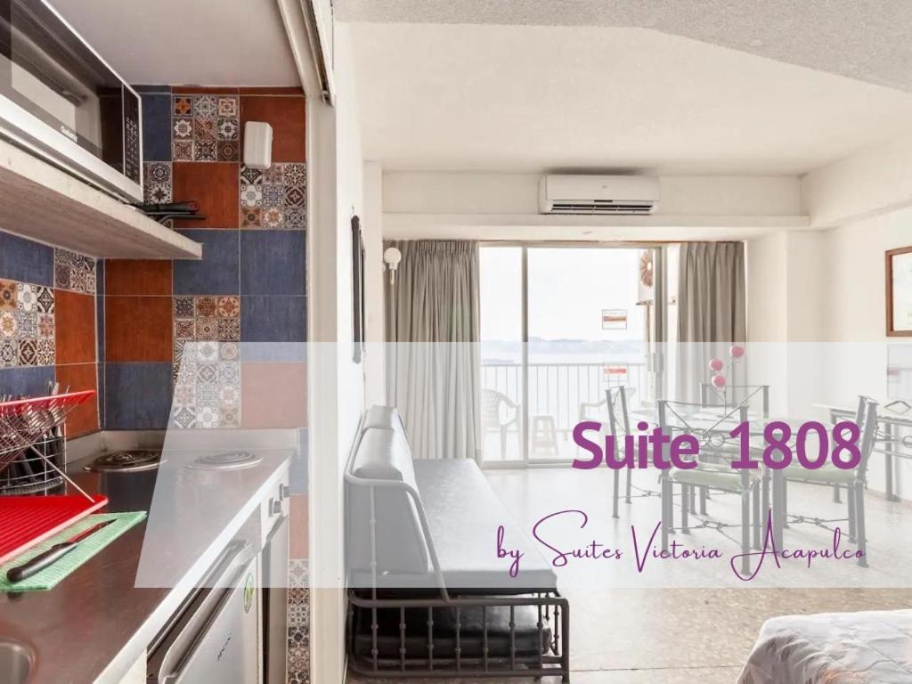 eine Küche mit einem Tisch und einem Esszimmer in der Unterkunft Suite 1808 by Suites Victoria Acapulco in Acapulco