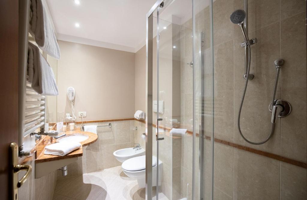 Koupelna v ubytování Charme Hotel