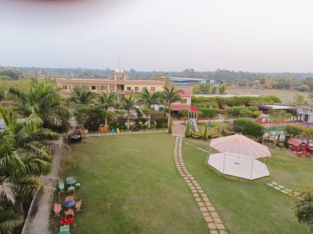 an aerial view of a park with a playground at Samardha Jungle Resort in Bhopal