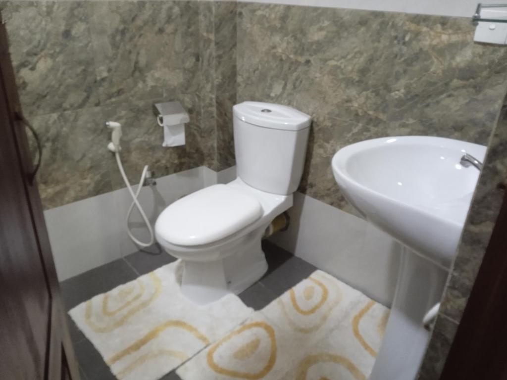 Koupelna v ubytování Alex Home Stay