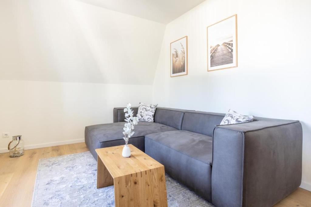 Posezení v ubytování Villa Dornkamp 4 - Luxuriöse Ferienwohnung für 4 Personen inklusive Balkon und Sauna