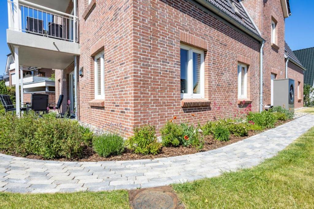 Zahrada ubytování Villa Dornkamp 4 - Luxuriöse Ferienwohnung für 4 Personen inklusive Balkon und Sauna