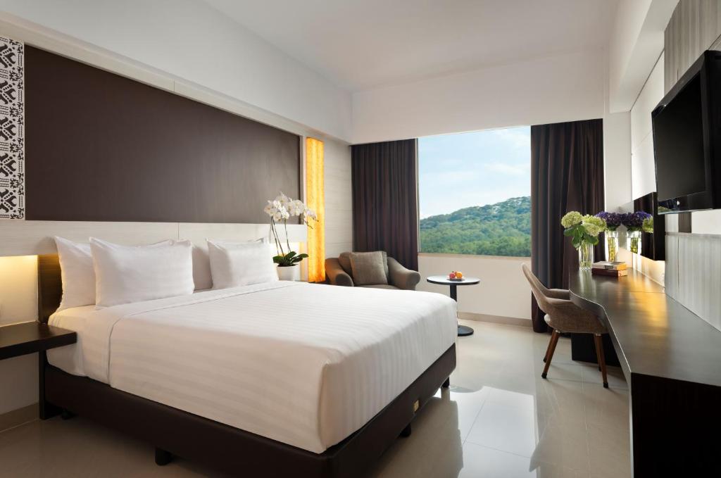 Postel nebo postele na pokoji v ubytování Atria Hotel Magelang