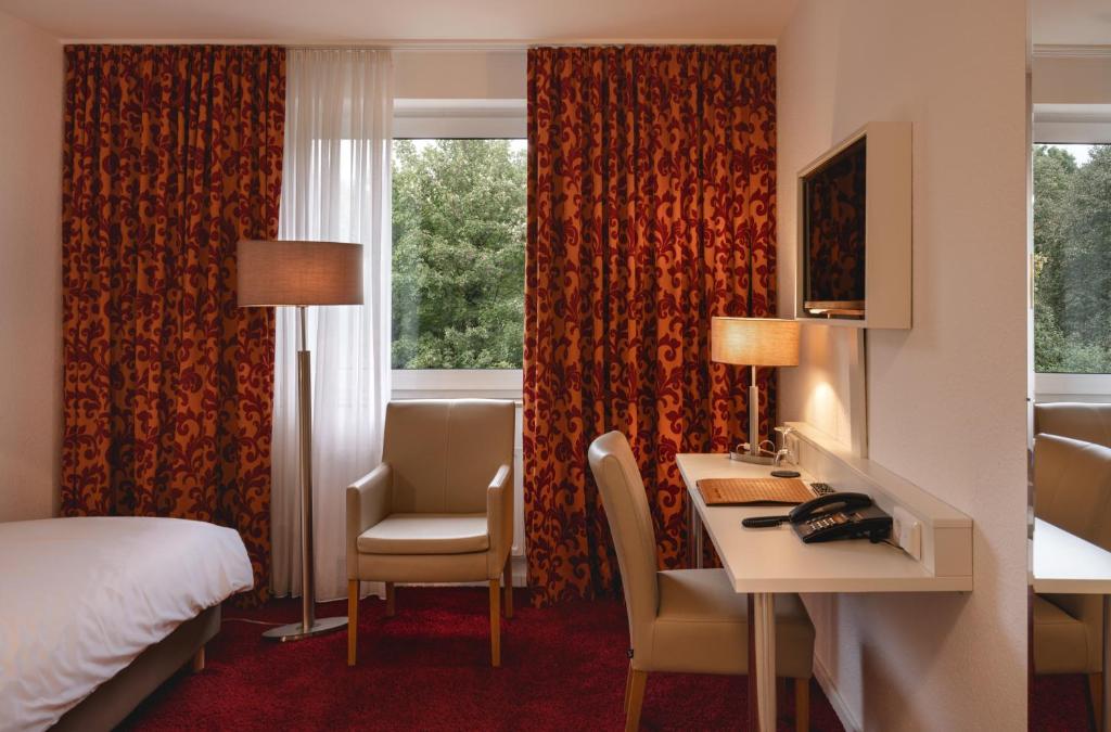 TV a/nebo společenská místnost v ubytování Hotel Astra
