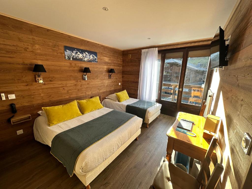 Postel nebo postele na pokoji v ubytování Hotel Le Soly