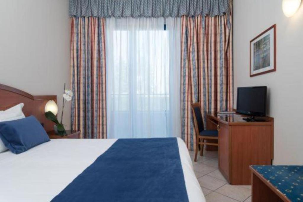 Łóżko lub łóżka w pokoju w obiekcie Blu Hotel - Sure Hotel Collection by Best Western