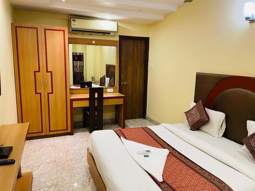 Postel nebo postele na pokoji v ubytování HOTEL AUGUSTO