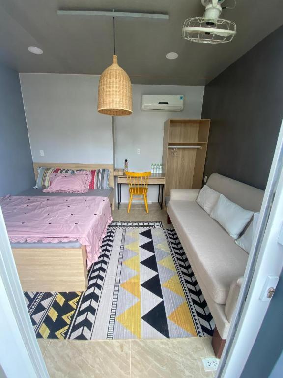 Postel nebo postele na pokoji v ubytování cinderella home stay