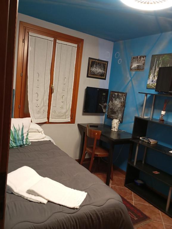 Postel nebo postele na pokoji v ubytování 49 Le Contesse Ide