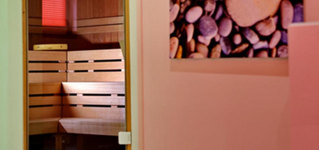 Postel nebo postele na pokoji v ubytování Hotel Alarun