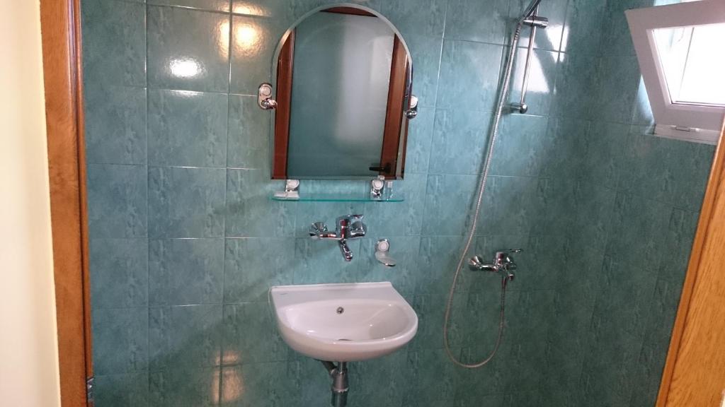 Koupelna v ubytování Classic Hotel