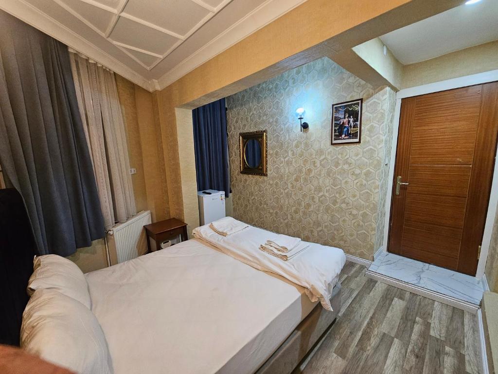 Postel nebo postele na pokoji v ubytování Asitane Life Hotel